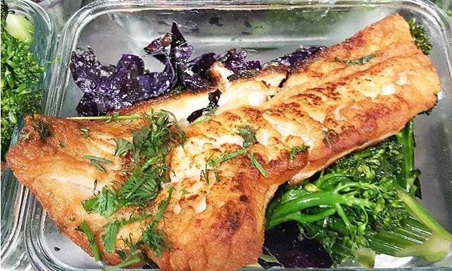 Pan seared wild Snapper atop organic grilled purple cabbage and organic extra virgin olive oil tossed baked broccolette spears