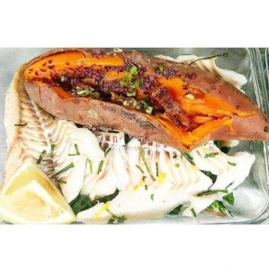 Baked herb and citrus wild haddock, our take or the classic "baked potato" organic Sweet potato (filled with: pastured hickory smoked bacon,  Dulse flakes,  green onions), tossed organic Swiss chard, lemon wedge