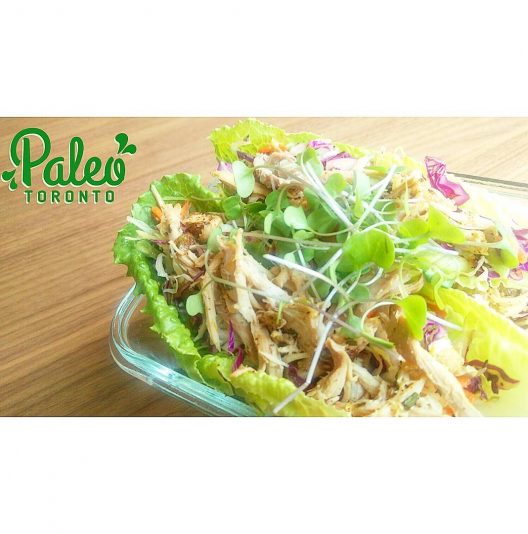 West Coast Paleo Turkey Tacos- Succulent roasted free range turkey hand pulled and seasoned, along with organic carrot and cabbage slaw. Organic romaine lettuce "taco shells". Topped with microgreen sprouts and black sesame seeds