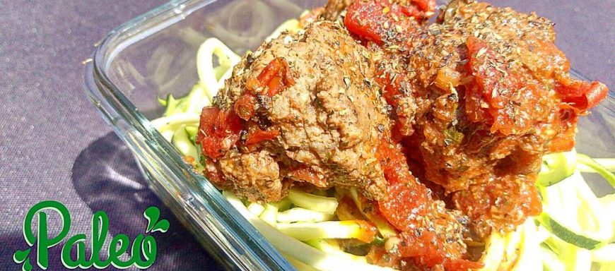 Nonna's handmade grassfed meatballs in overnight Sunday tomato marinara served atop spiralized organic zuchinni noodles. Garnished with organic oregano