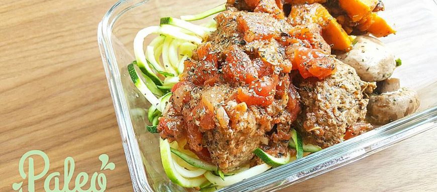 Nonnas handmade grassfed beef meatballs in overnight Sunday tomato marinara served atop spiralized organic zuchinni noodles, baked button mushrooms and caramelized sweet potato