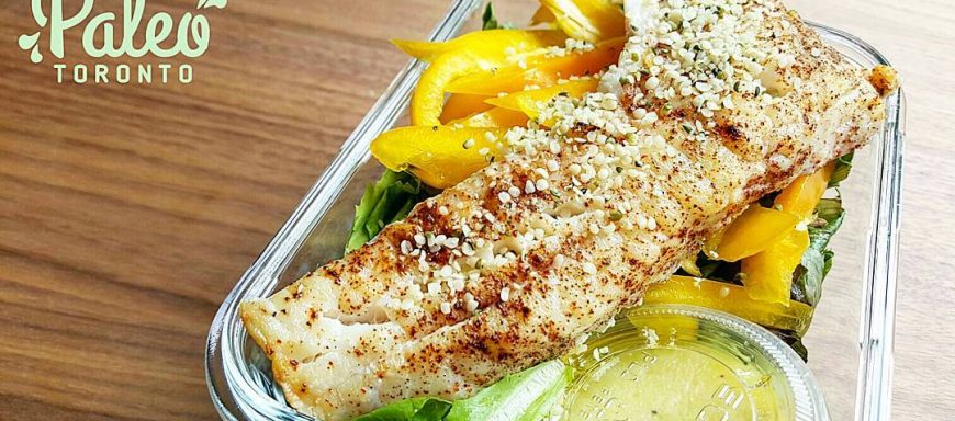 Big Wild Snapper salad - tender baked fillets crusted with organic Ancho pepper and hemp hearts,  mixed organic field greens,  julienned yellow bell pepper, house lemon poppy vinaigrette dressing